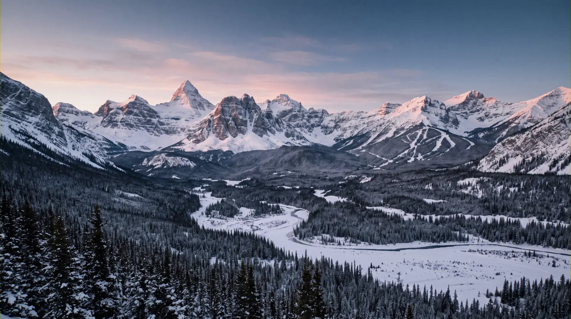 Snow-covered peaks above the Bow Valley in Banff National Park, Alberta, where the region's only ski-in ski-out hotel sits above Banff Sunshine