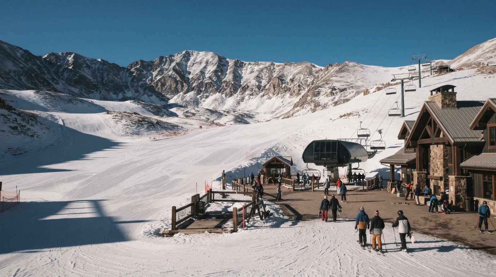 The Peak 8 base plaza below the Ten Mile Range where the ski-in ski-out lodging in Breckenridge, Colorado sits
