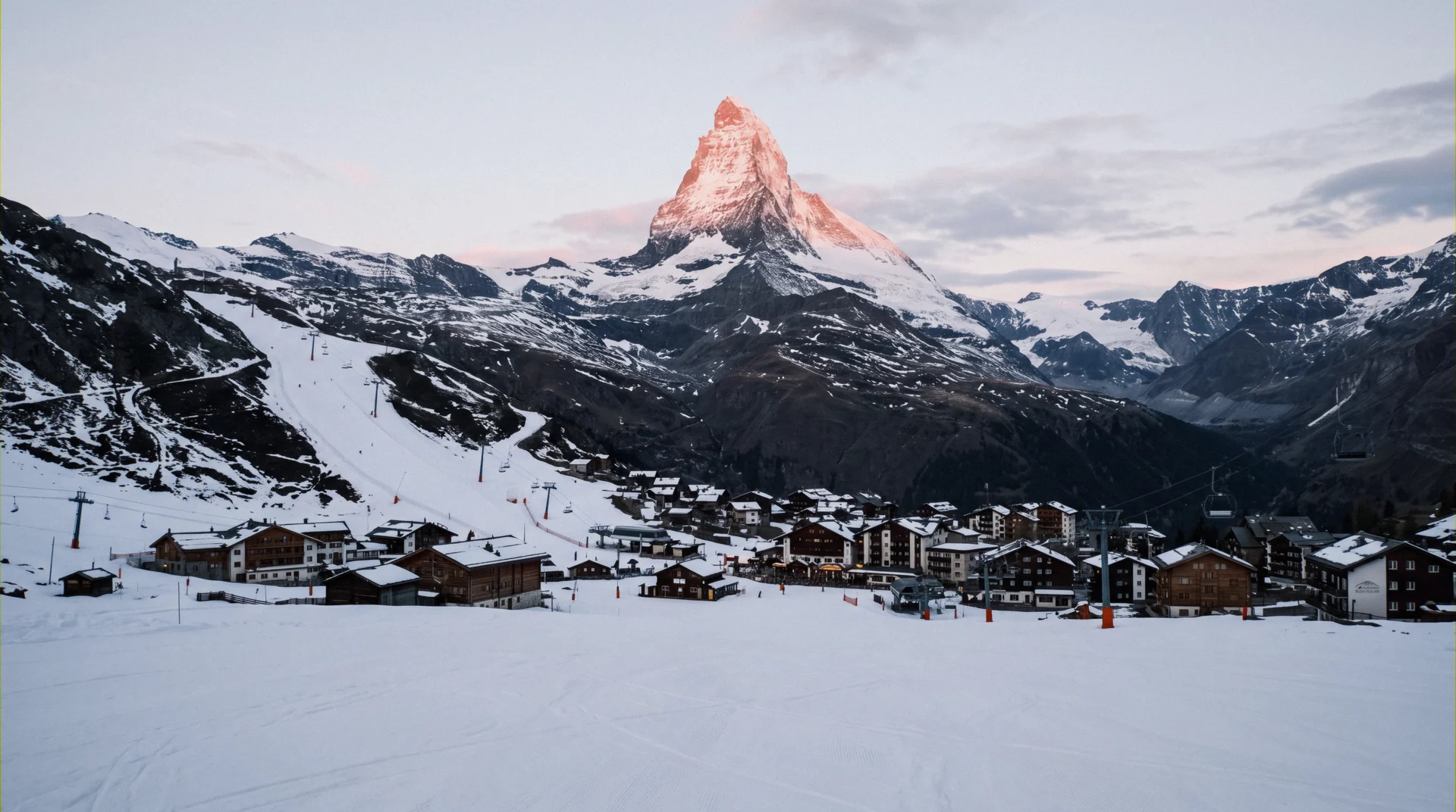 Mt. Crested Butte rising above the base village in Colorado, where the ski-in ski-out lodging at Crested Butte sits