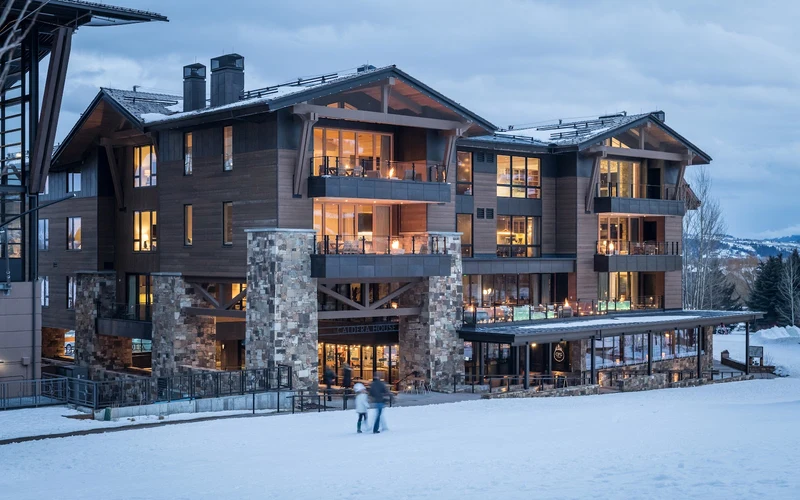 Caldera House beside the aerial tram in Teton Village, steps from the ski-in ski-out hotels of Jackson Hole, Wyoming