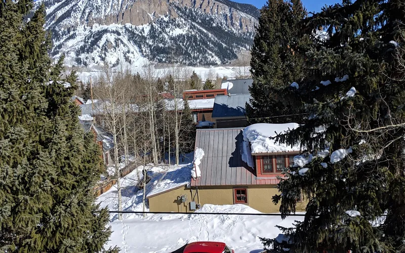Elk Mountain Lodge on Gothic Avenue in the historic town, three miles from the ski-in ski-out lodging at Crested Butte, Colorado