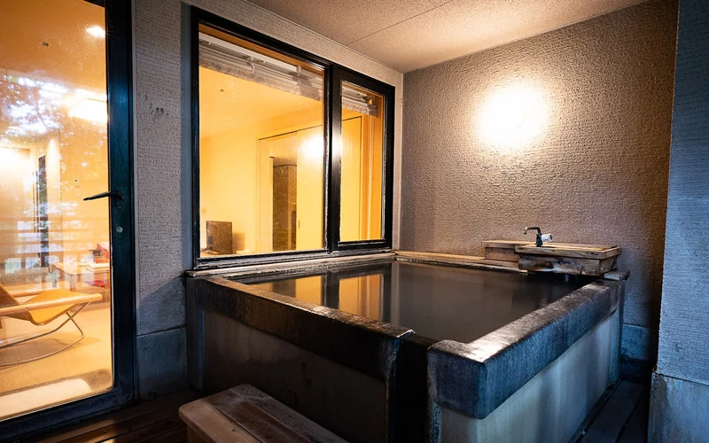 Hotel Kanronomori in forest at Niseko Konbu Onsen, shuttle-access lodging for the Niseko ski areas