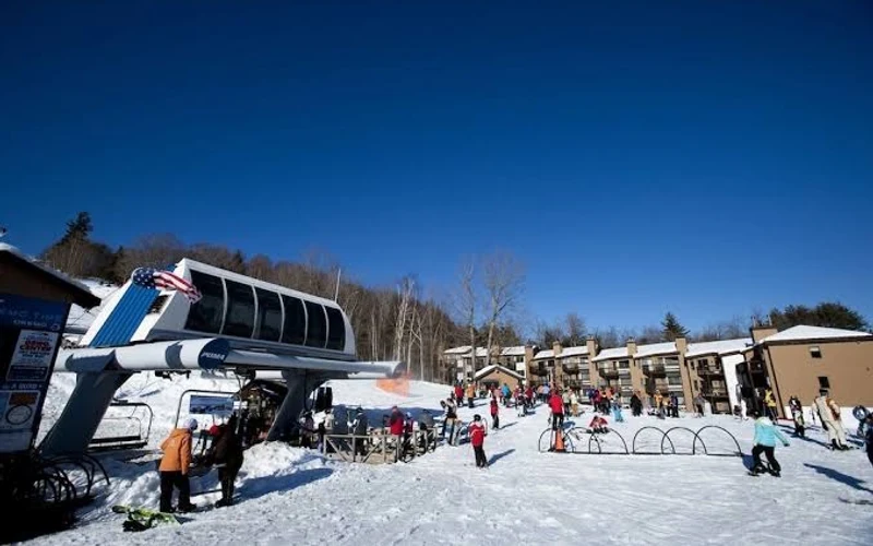 Mountain Lodge at Okemo beside the Clock Tower base lodge, ground-floor ski-in ski-out lodging at Okemo, Vermont