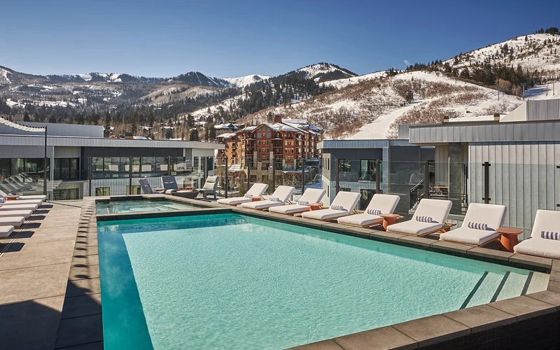 The rooftop pool at Pendry Park City above upper Canyons Village, a ski-in ski-out hotel in Park City, Utah