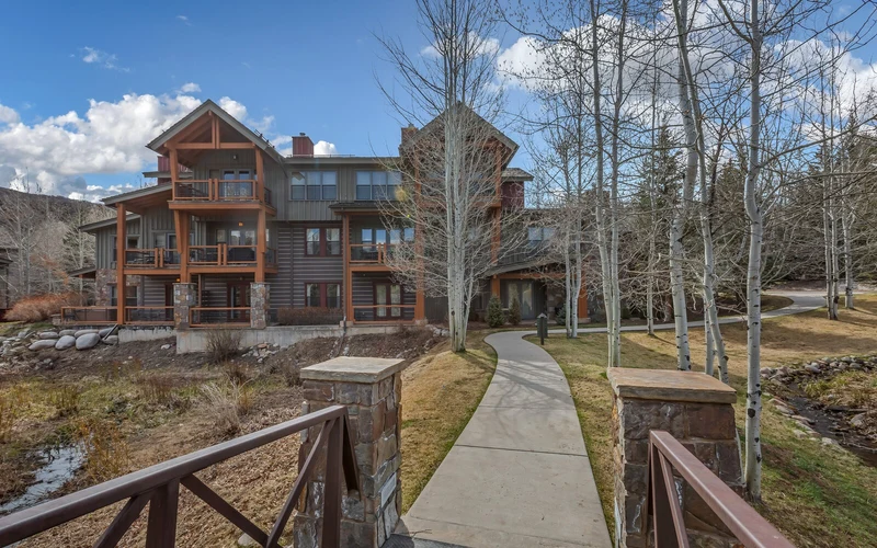 Residences at Snowmass Club on the golf course two miles from the ski-in ski-out hotels of Snowmass Village, Aspen, Colorado