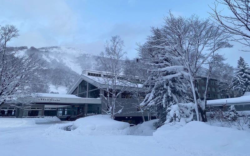 The Green Leaf Niseko Village beside the Banzai chair in Niseko Village, near-slopeside lodging in Niseko, Japan