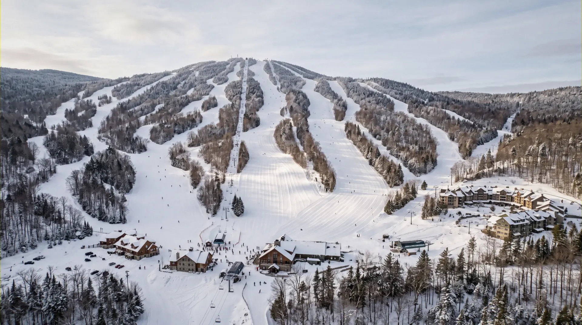 Okemo Mountain above Ludlow, Vermont, with the trails that serve the ski-in ski-out lodging at Okemo cut down the face